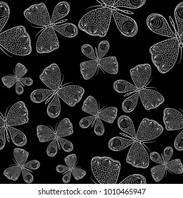 Seamless pattern with white and black butterflies 
