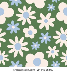 Seamless pattern with white and blue groovy daisy flowers on a green background. Pastel colors. Vector illustration