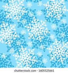 Seamless pattern of white and blue snowflakes of different sizes on a light blue background. Winter background for Christmas or New Year design. Vector illustration.