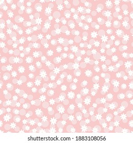 Seamless pattern. White chamomile or daisy and round spots on a pink background. Cute print for baby textiles or clothing. Hand drawing. Vector illustration. Flat style.