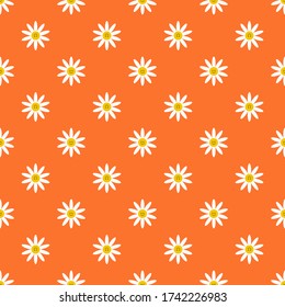 Seamless pattern with white chamomile with happy face on orange background. Summer vector illustration for wrapping paper, wallpaper, fabric, textile and more.