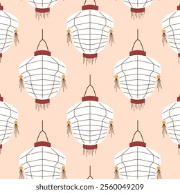 Seamless pattern of white Chinese lantern with tassel on a peach background. Perfect for festive design, textile, wrapping paper and cultural decorative project.