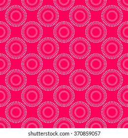 Seamless pattern of white circles of dots on an pink background. Vector painted hands.