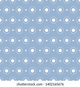 Seamless pattern with white circles on a light blue background