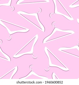 Seamless pattern of white clothes hangers on pink background. Vector flat illustration. Background for clothing stores, sales