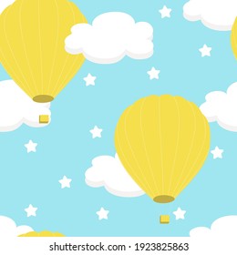 Seamless pattern with white clouds and yellow balloons on a blue sky background. For printing on fabrics, textiles, paper, bedding. Vector graphics.