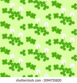 Seamless pattern of white clover on a light green background
