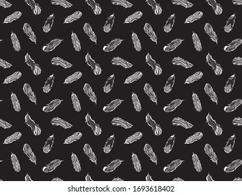Seamless pattern of white contour bird feathers drawn by hand in the style of zentangle on a black background. Texture for textile, fabric, fashion, wrapping, wallpaper. Vector.