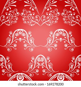 Seamless pattern from white curls on a red background