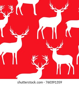 Seamless pattern with white deer on red background. Vector illustration.