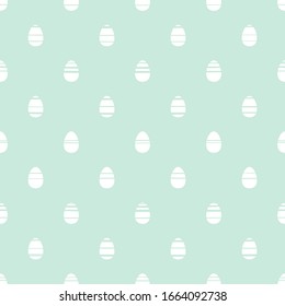Seamless pattern with white Easter eggs isolated on powder turquoise background. Cute Vector illustration. Soft pastel ornament.