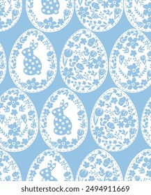 Seamless pattern with white Easter eggs.Easter seamless pattern with rabbit, chamomile, eggs, leaves on blue  background.