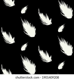 Seamless pattern with white feathers on a black background. Delicate background