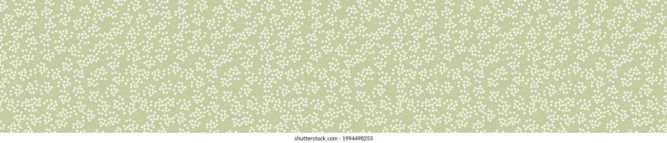 Seamless pattern with white flowers and green background