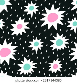Seamless pattern with white flowers and multicolored circles on a black textured background.