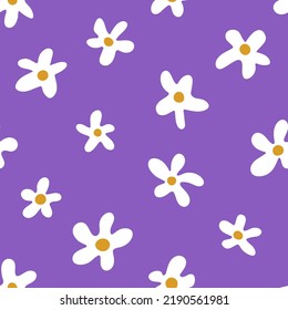 Seamless pattern with white flowers on violet background. Hand drawn vector illustration. Trendy texture for print, textile, fabric, packaging.