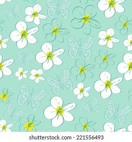 Seamless pattern with white flowers on a blue background. vector