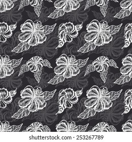 Seamless pattern with white flowers on a black background. Vector illustration for your design