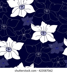 Seamless pattern with white flowers on a blue background. Hand drawn floral texture.