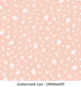 Seamless pattern with white flowers and pink background