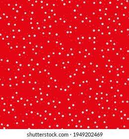 Seamless pattern with white flowers and red background