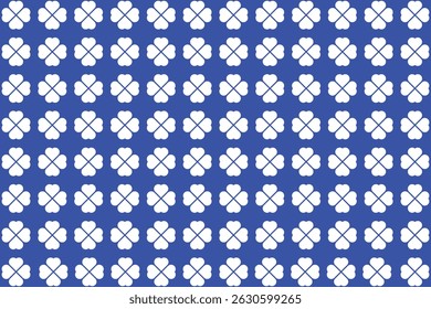 Seamless Pattern of White Four-Leaf Clovers on a Deep Blue Background.
