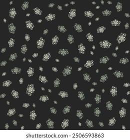 Seamless pattern of white, green floral designs on a black background.