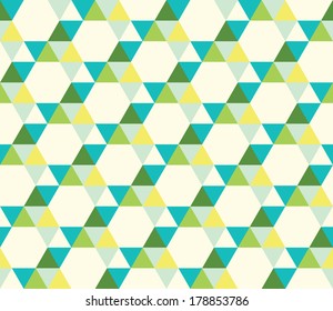 seamless pattern of white, green, yellow triangles on a white background