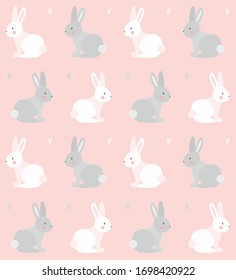Seamless pattern with white and grey rabbits, hearts, on the pink background