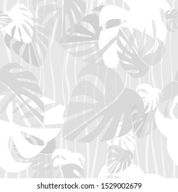 Seamless pattern. White and grey tropical leaves on light vintage backround. Vector graphic illustration.