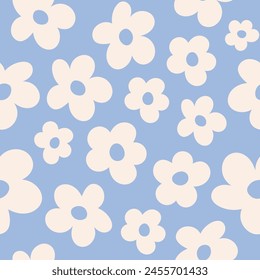 Seamless pattern with white groovy daisy flowers on a blue background. Vector illustration