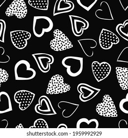Seamless pattern of white hearts on a black background. The elements are hand-drawn and have a dot texture. Black and white background with heart icons. Vector illustration.