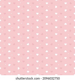 Seamless pattern of white hearts on a pink background. Use on Valentines Day on textiles, wrapping paper, backgrounds, souvenirs. Vector