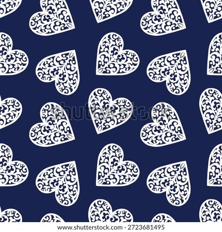 Seamless pattern with white hearts on a blue background. Repetitive vintage romantic prints. Valentine's Day wrapping paper.
