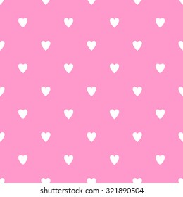 Seamless pattern with white hearts style polka dot on a gentle pink background