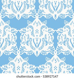 Seamless pattern with white lace on blue background. Hand-drawn illustration. 