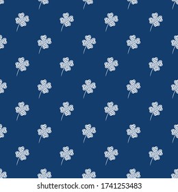 Seamless pattern with white mosaic clover leaves. Modern background with repeating elements for packaging, printing, fabric. Vector illustration