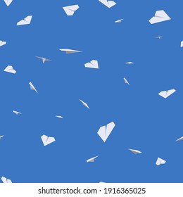 seamless pattern of white paper airplanes on blue background
