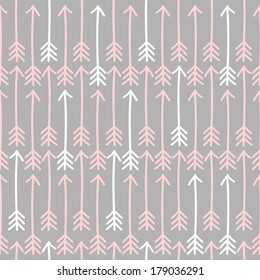 Seamless pattern with white and pink arrows against gray background.