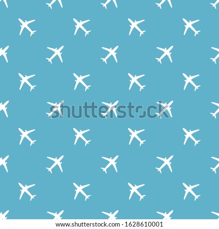 Seamless pattern with white plane silhouettes on blue background. Vector illustration for wrapping paper, wallpaper, fabric, textile and more.