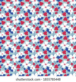 Seamless pattern with white and red flowers and blue leaves on a blue background. Ditsy ornament for fabric,invitations, wrapping paper, cards and other materials.