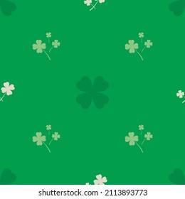 Seamless pattern with white shamrock, clover on green background.  Saint Patrick's Day pattern. Vector illustration.