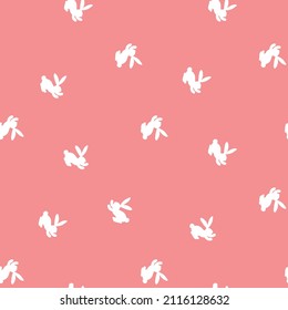 Seamless pattern with white silhouette Easter rabbits on pink background. Design for card, postcard, wallpaper, fabric, textile. Vector stock illustration. Cartoon style.