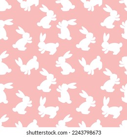 Seamless pattern with white silhouette Easter rabbits on pink background. Design for card, postcard, wallpaper, fabric, textile. Vector stock illustration. Cartoon style.