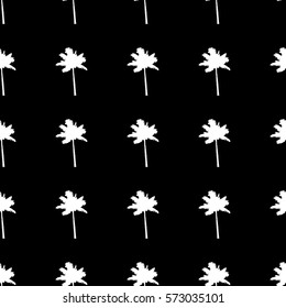 Seamless pattern with a white silhouette of a palm tree on a black background.