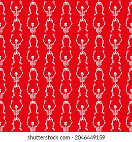 Seamless pattern with white skeletons on a red background . Halloween pattern .Vector illustration 