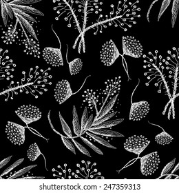 Seamless pattern with white sketch flowers on black background. Endless illustration with flowers drawn strokes, lines and dots.