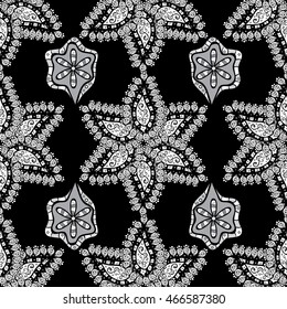 Seamless pattern with white sketch flowers on black background. Endless illustration with flowers drawn strokes, lines and dots.