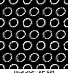 Seamless pattern with white sketch hand drawn pencil scribble ellipse shape on black background. Abstract grunge texture. Vector illustration