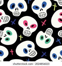 Seamless pattern with white skulls and multicolored crosses on a black background. Vector illustration